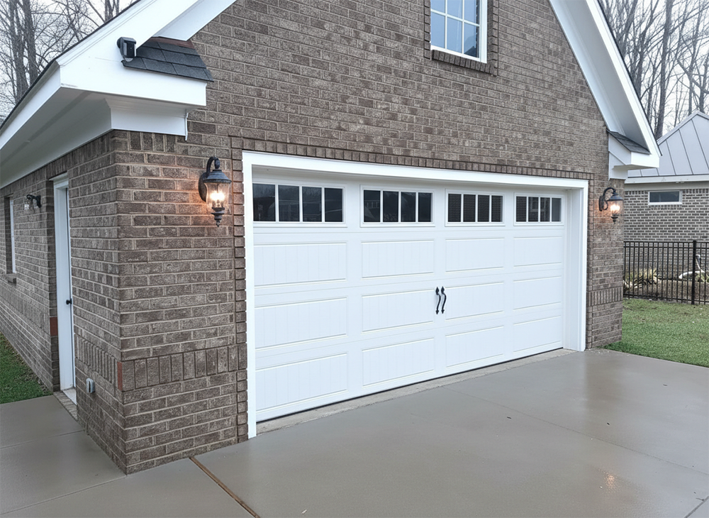 Style Garage Doors: 2026 Guide To Popular Designs &Amp; Trends For Chicago Homes Brick Detached Garage Featuring A White Carriage-Style Design With Decorative Hardware, Showcasing Stylish Garage Door Options Installed By Lead Contractor Dmytro Shevchenko In North West Chicago.