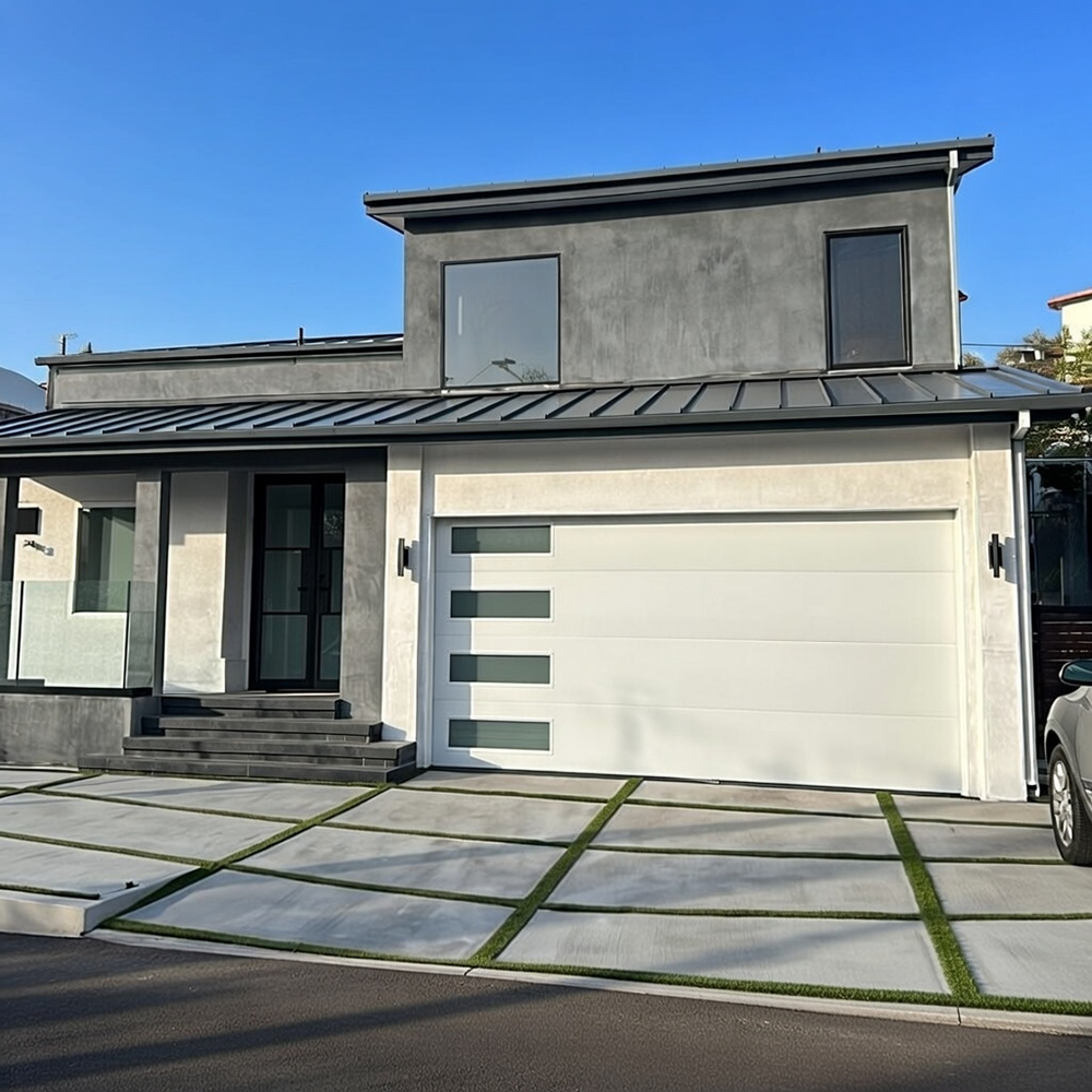 New Style Garage Doors: 2026 Trends &Amp; Modern Designs For Chicago Homes Contemporary Home Exterior Featuring A White Flat-Panel Design With Vertical Windows As An Example Of Modern Garage Door Options, Installed By Lead Contractor Dmytro Shevchenko In North West Chicago.