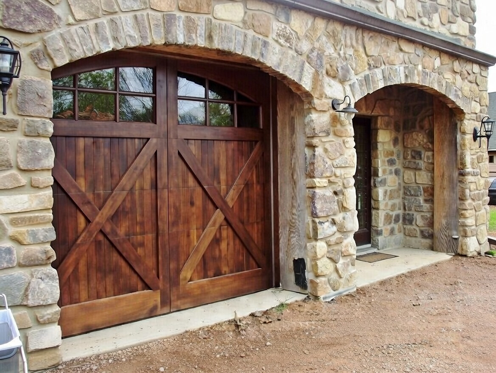Arched Stone Entryway Featuring A Rustic Dark Wood Carriage-Style Design With Crossbuck Panels As Premium Garage Door Options, Installed By Lead Contractor Dmytro Shevchenko In North West Chicago.
