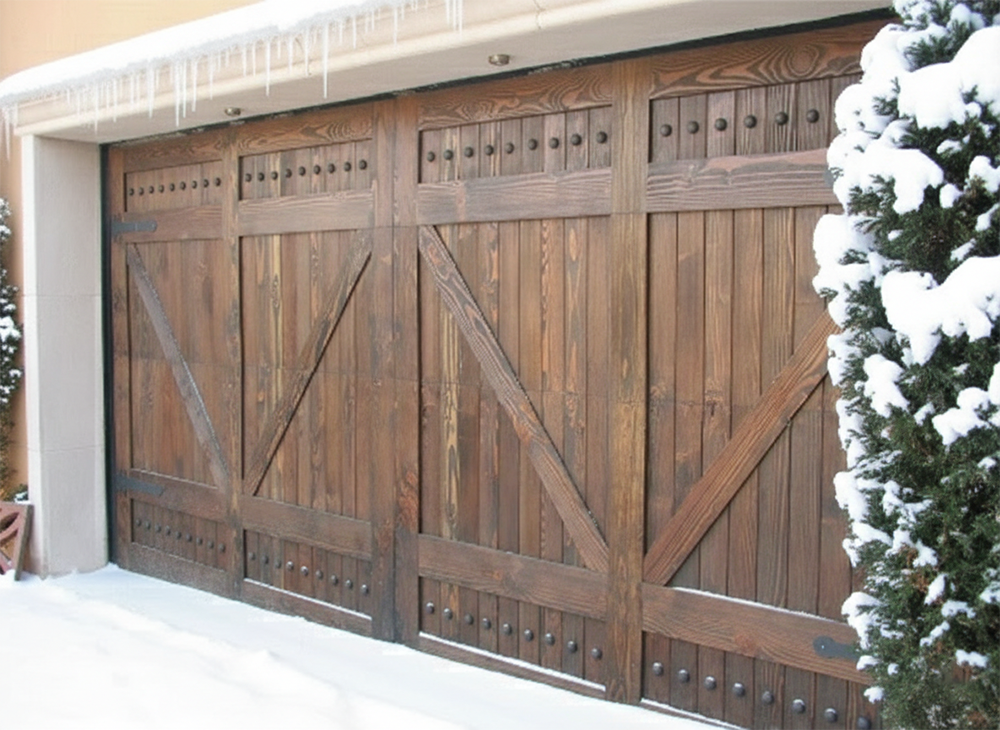 A Stunning Rustic Dark Wood Garage Door Featuring Decorative Iron Studs And Cross-Buck Detailing, Framed By Icicles And A Snow-Covered Evergreen Bush. This Custom Installation Highlights The Unique, High-End Garage Door Options Available From Lead Contractor Dmytro Shevchenko For Homes In North West Chicago.