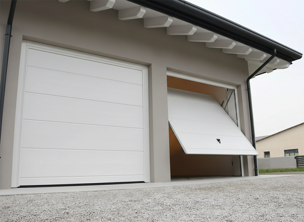 Two Modern White Horizontal Panel Garage Doors On A Residential Building, With One Door Partially Open, Highlighting The High-Quality Garage Door Options Offered By Lead Contractor Dmytro Shevchenko In North West Chicago.
