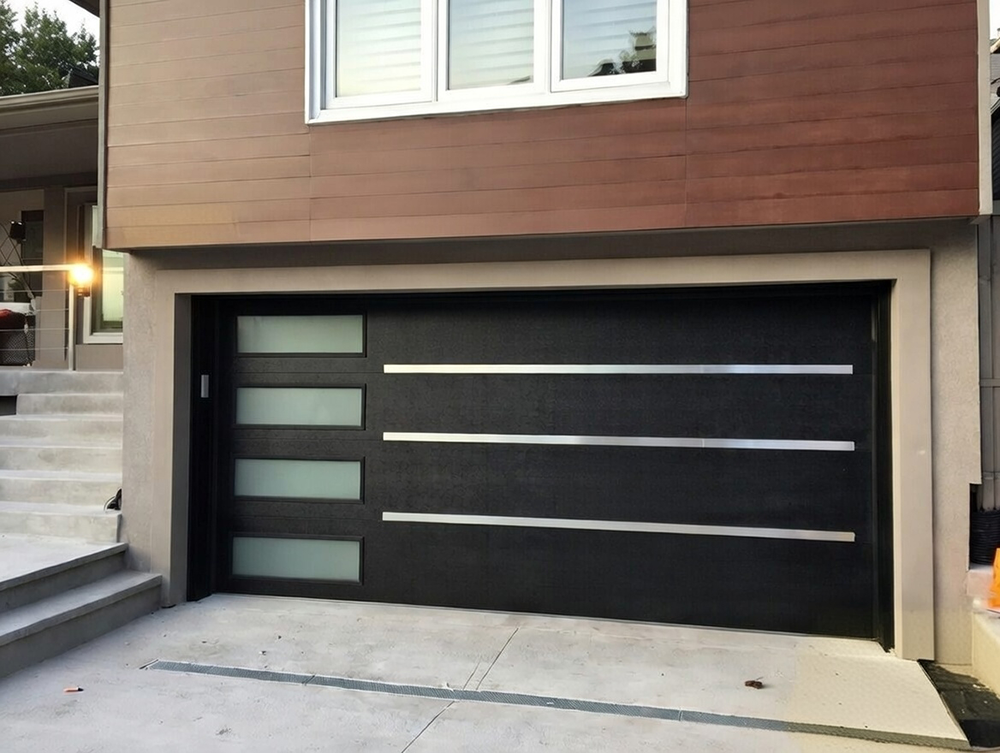 Modern Contemporary Black Sectional Garage Door With Three Frosted Glass Panels And Horizontal Chrome Accent Bars, Installed On A Two-Story Home With Wood-Look Siding In Brown Tones – Garage Door Options By Lead Contractor Dmytro Shevchenko, North West Chicago