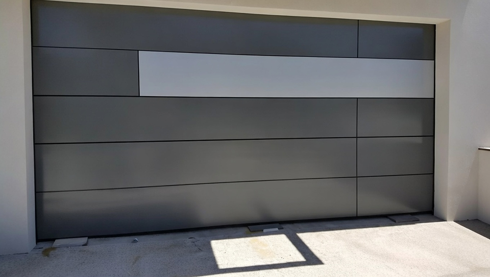 Residential Garage Door Designs: The Ultimate 2026 Style &Amp; Performance Guide Sleek Modern Residential Garage Door Designs In Metallic Gray With Horizontal Panels And Accent White Stripe, Custom Installed By Lead Contractor Dmytro Shevchenko In North West Chicago