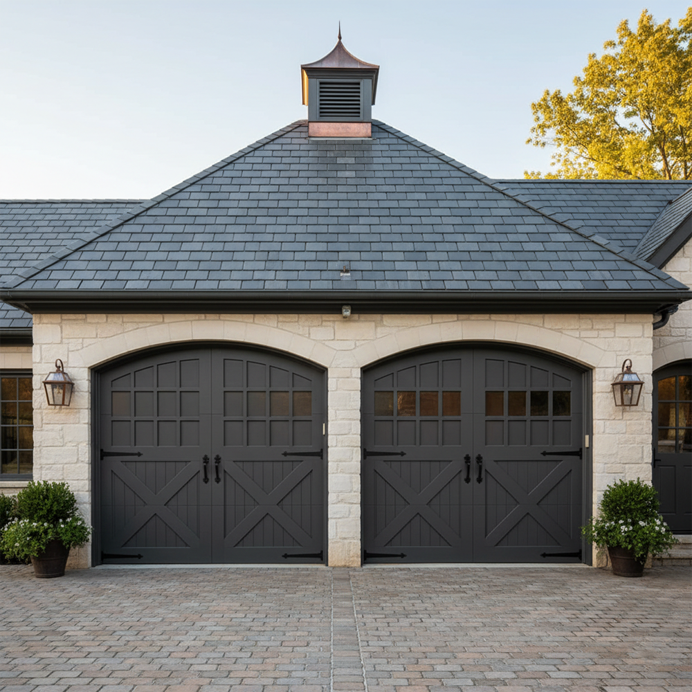 Residential Garage Door Designs: The Ultimate 2026 Style &Amp; Performance Guide Luxury Carriage-Style Residential Garage Door Designs In Dark Gray With Arched Tops, Crossbuck X Panels, And Decorative Hardware On A Stone Home With Cupola Roof, Installed By Lead Contractor Dmytro Shevchenko In North West Chicago