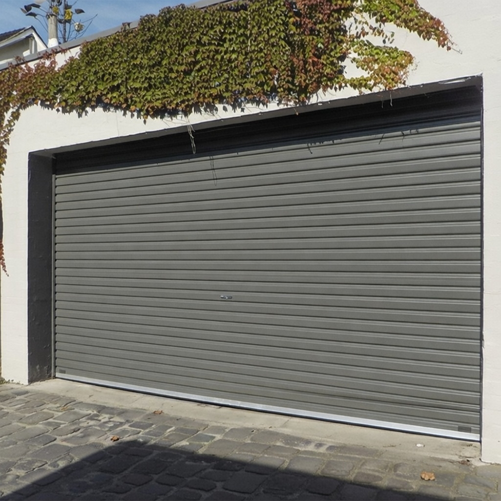 What Is A Garage Door Called? A Guide To Names And Terminology Example Of A Sleek Gray Roll-Up (Roller Shutter) Garage Door (Commonly Called A Roll-Up Garage Door) Installed On A Residential Building Exterior With Ivy Overhead, By Lead Contractor Dmytro Shevchenko In North West Chicago. What Is A Garage Door Called? This Type Is Known As A Roll-Up Garage Door.