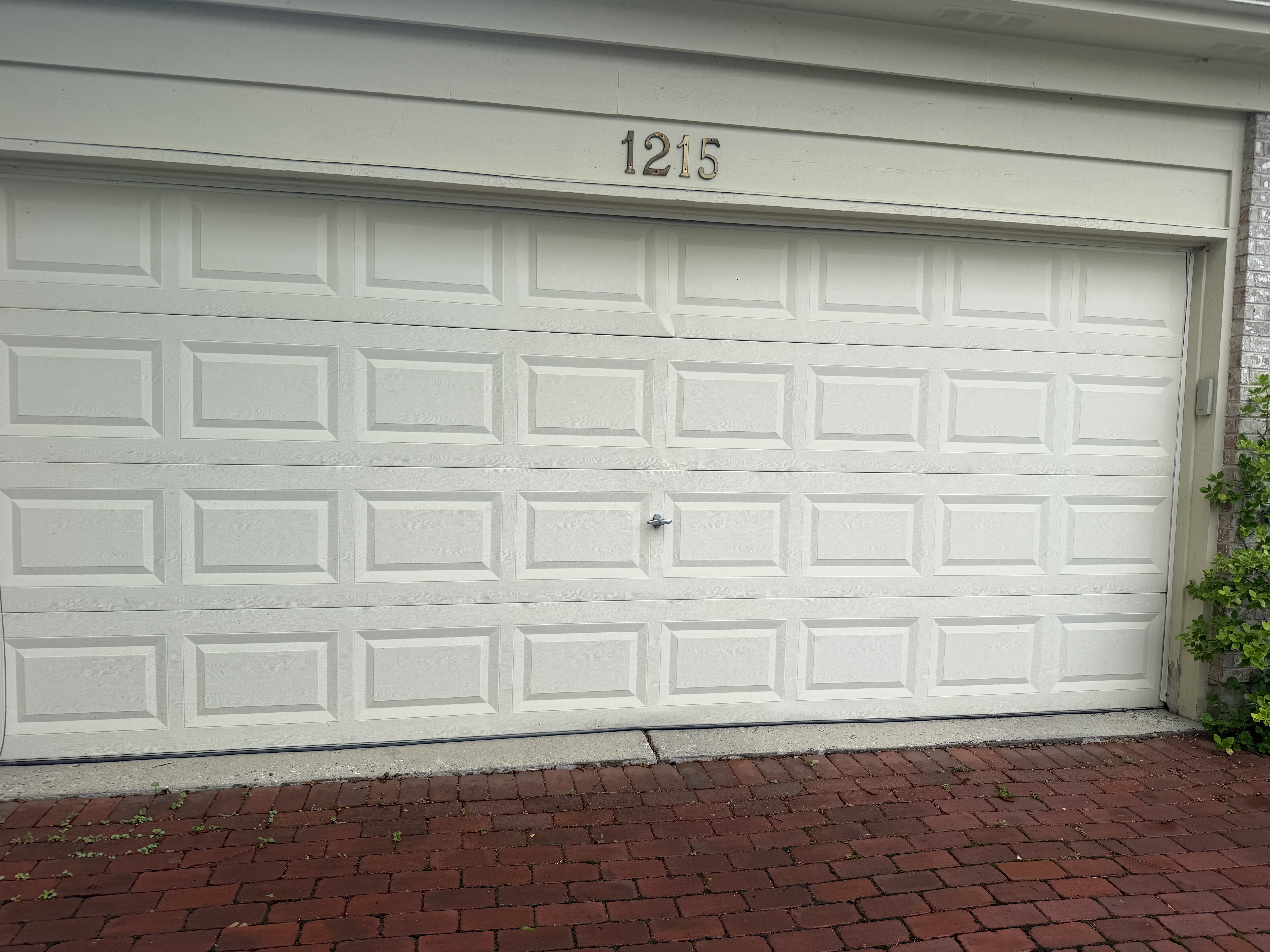 Garage Door Off-Track Repair And Reinforcement In Mundelein, Il Dmytro Shevchenko Testing A Fully Repaired And Reinforced Garage Door In Mundelein For Smooth And Safe Operation