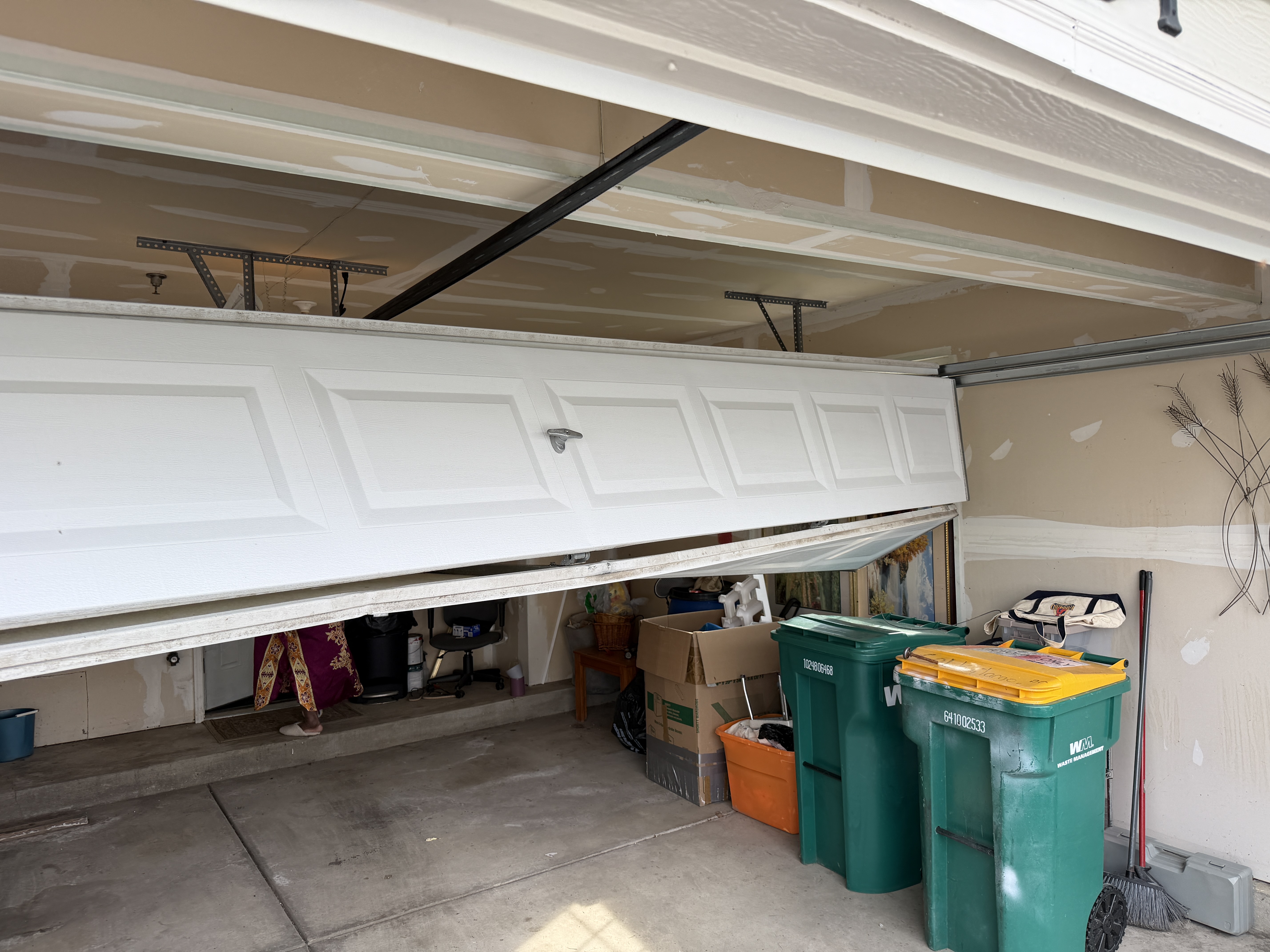 Garage Door Off-Track Repair And Reinforcement In Mundelein, Il Primegdr Reinforcing Garage Door Panels With Heavy-Duty Horizontal Struts In Mundelein